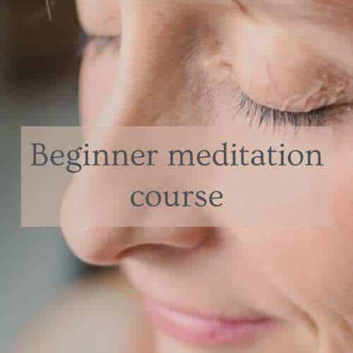 Beginner meditation course visual of a female person meditating.