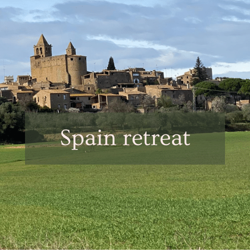 An image of the Madremanya castle in Spain, with "Spain retreat" written across it.